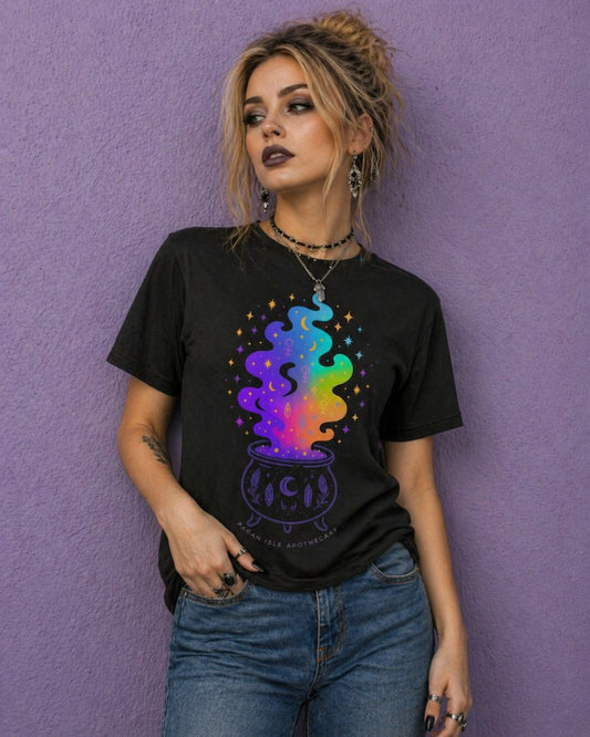 Woman wearing black witchy t shirt with colorful cauldron design in witch aesthetic clothing style