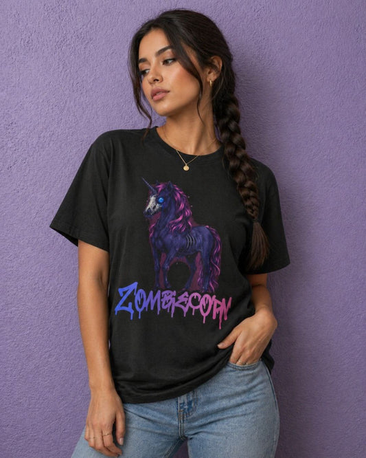 Woman wearing a black spooky shirt with Zombiecorn creepy unicorn design styled as casual gothic outfit