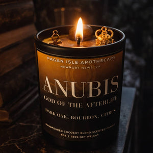 Anubis crystal candle featuring dark ritual crystals, created for protection, transition, and ancestral magic