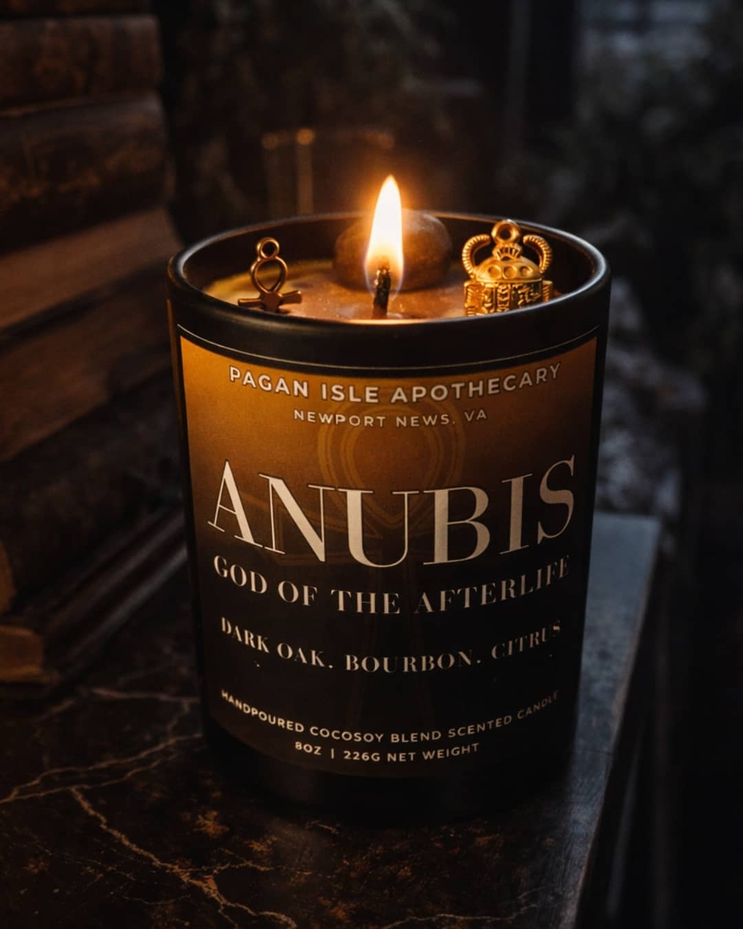 Anubis crystal candle featuring dark ritual crystals, created for protection, transition, and ancestral magic