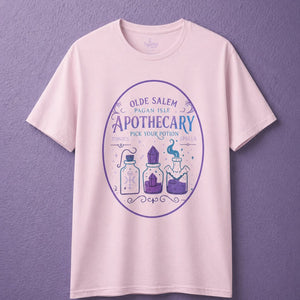 Light pink witchy t shirt with apothecary shirt design featuring potion bottles in soft mystical tones