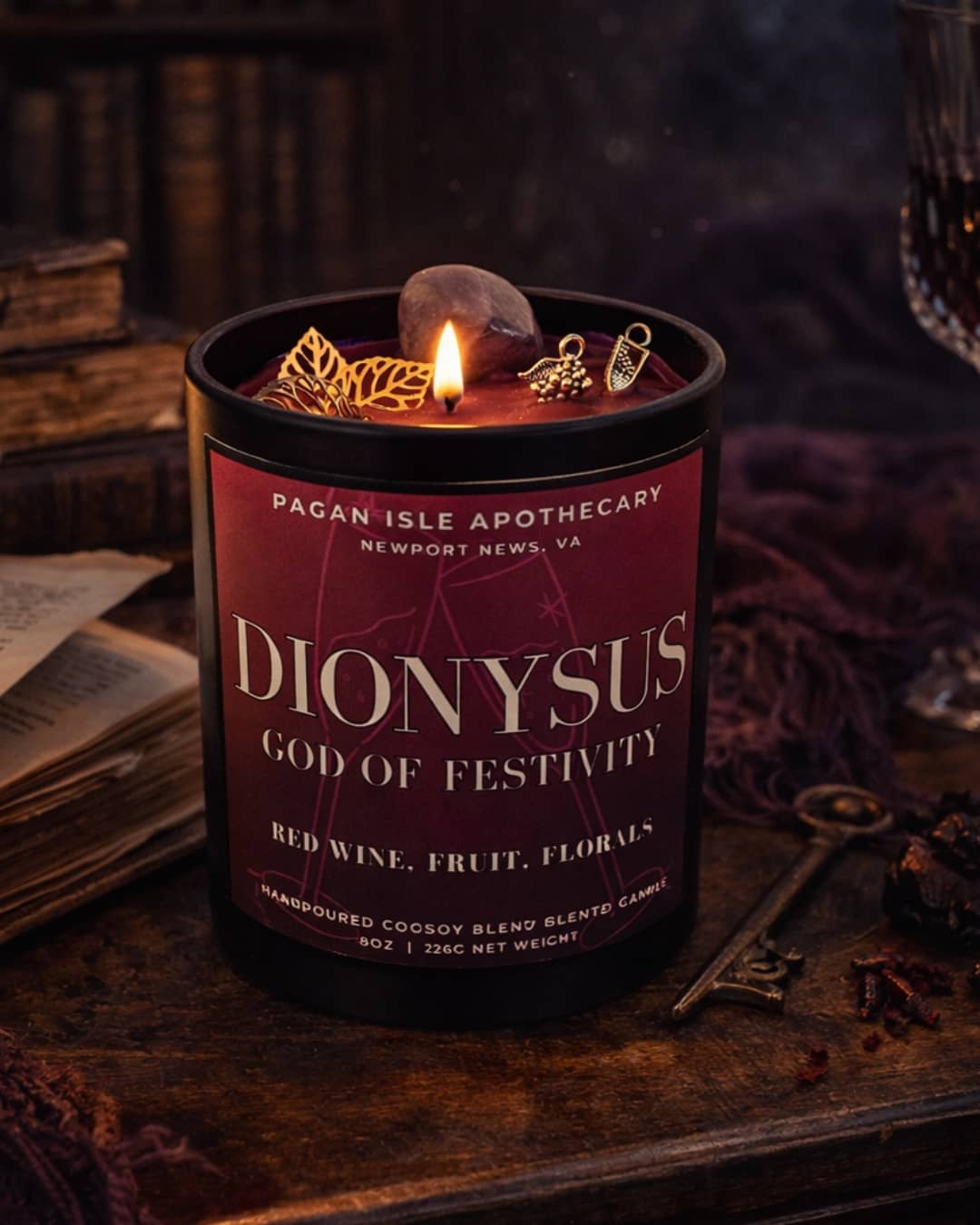 Dionysus crystal candle with vibrant crystals, designed for celebration, pleasure, and uninhibited magic.