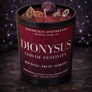 Dionysus deity crystal candle celebrating pleasure, chaos, and liberation, featuring rich colors and crystals for ecstatic rituals and bold altar decor.