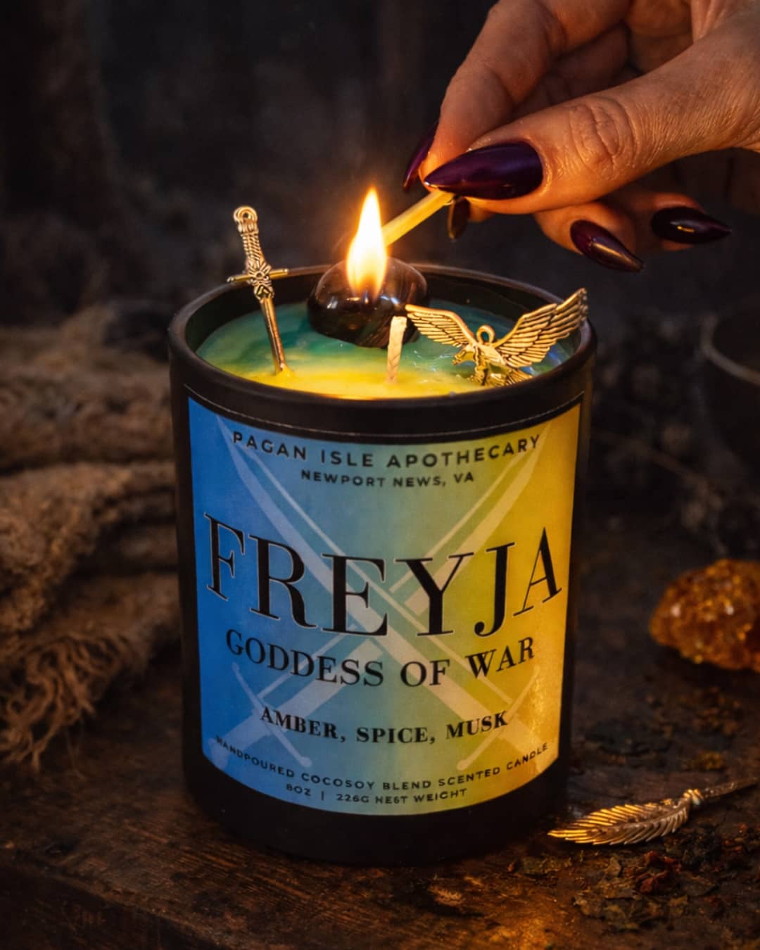 Freyja crystal candle featuring sacred crystals, created for passion, protection, and Norse-inspired magic.