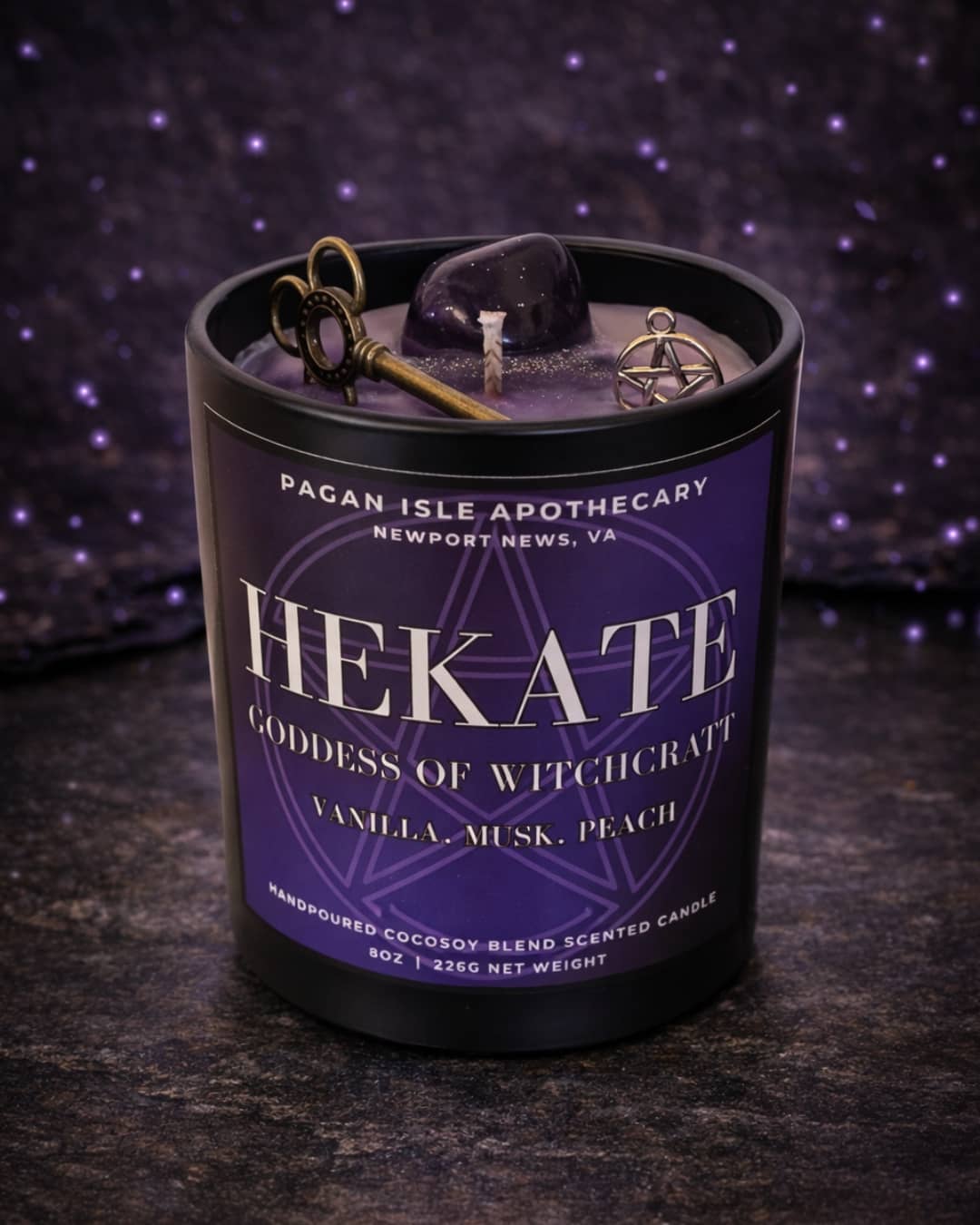Hekate deity crystal candle representing witchcraft, crossroads, and spiritual guidance, crafted with crystals and dark magical symbolism for altar work.
