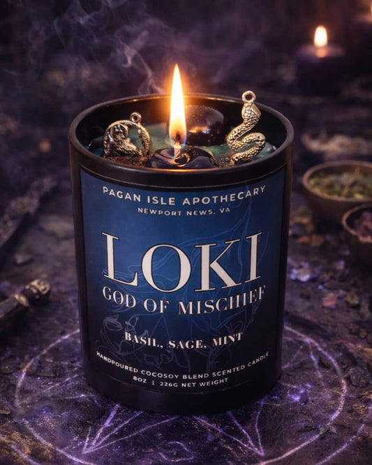 Loki crystal candle with dynamic ritual crystals, designed for transformation, mischief, and personal evolution.
