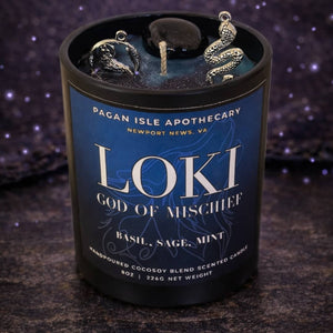 Loki deity crystal candle inspired by the Norse trickster god, featuring dynamic magical energy and crystal accents for chaos magic and transformation work.