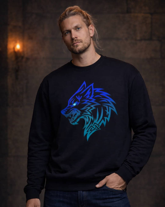 Model wearing the black Nordic Wolf sweatshirt featuring a bold Norse-inspired wolf design in a dark, moody studio setting.