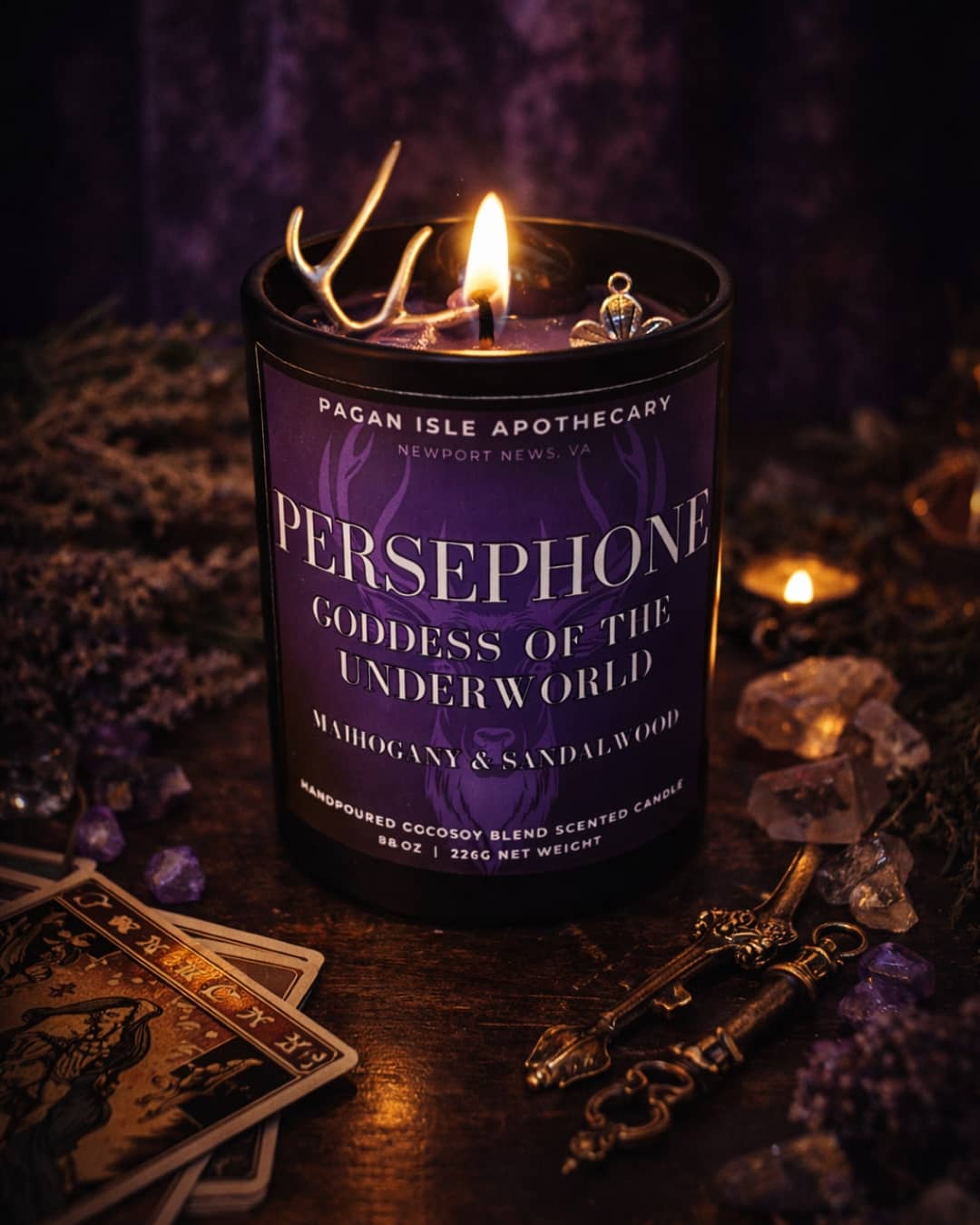 Persephone crystal candle decorated with symbolic crystals, representing rebirth, balance, and inner transformation.