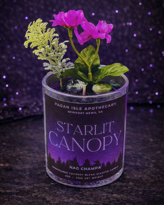 Celestial forest candle inspired by starlight filtering through treetops, blending woodland energy with cosmic magic for ritual and relaxation spaces.