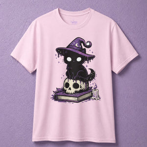 Pink witchy t shirt with cute witch shirt design showing black cat sitting on skull and book