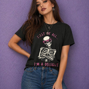 Woman wearing black witchy t shirt with funny witch shirt skeleton design and pink text spooky cute shirt style